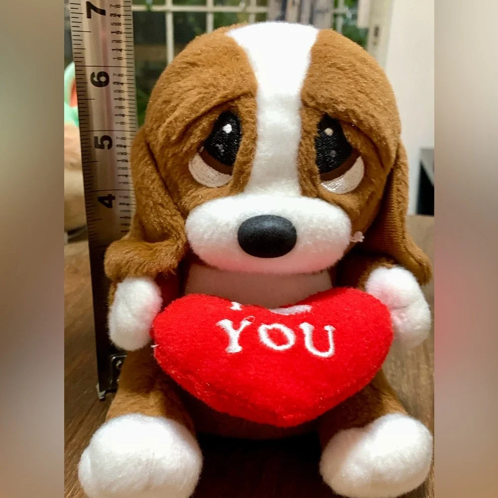 Brown and White Plush Dog Toy with Red Heart